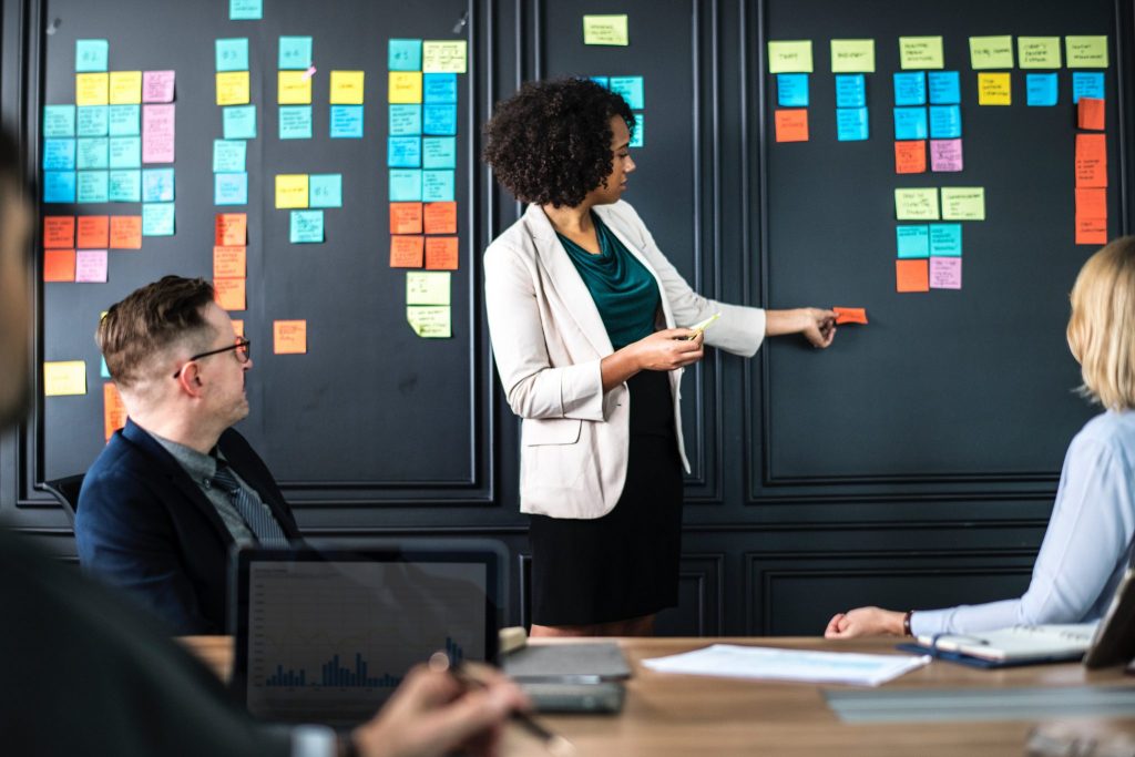 Professionals in a work meeting brainstorming for a project.