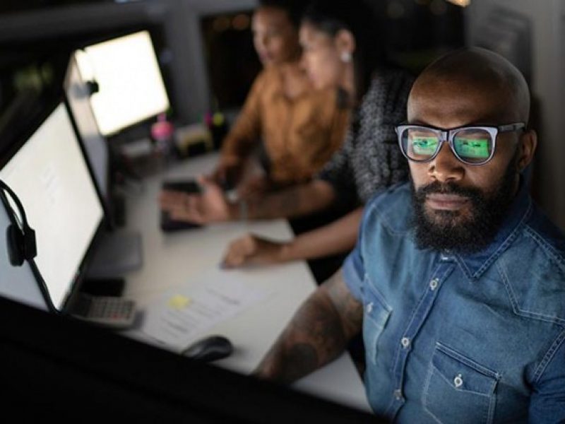 EDGE UP: Man using a computer