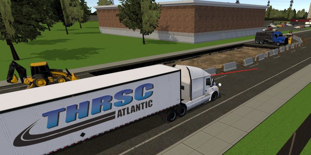 Birds-eye view screenshot from simulator showing truck being driven