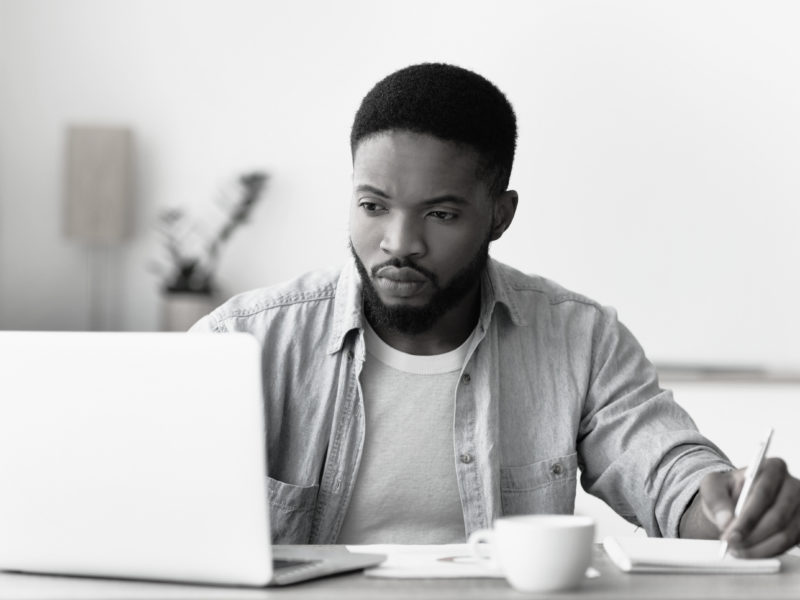 Man is working on his computer