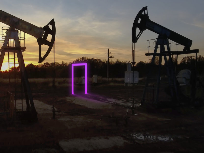 oil rigs with glowing pink gateway