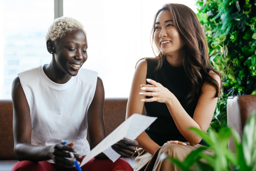 stock image of two colleagues talking