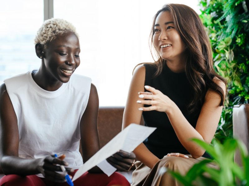 stock image of two colleagues talking