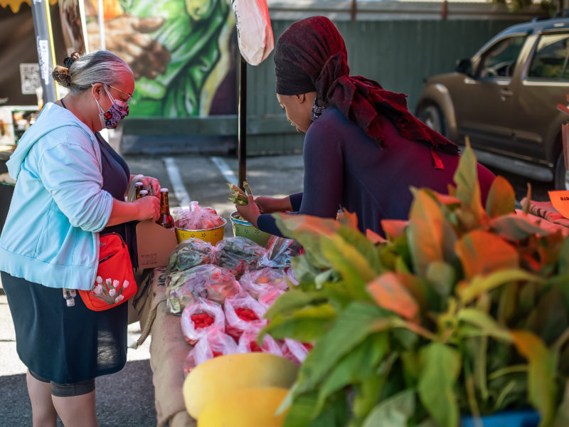 two people in a market