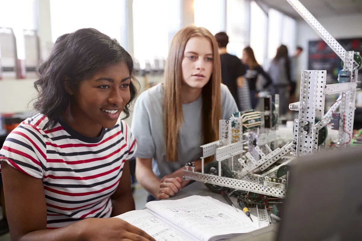 two people looking at a computer