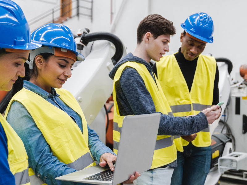 Four industrial engineers working