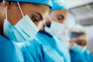 Health, doctor with face mask and surgery, surgeon and operating room, hospital and healthcare zoom.