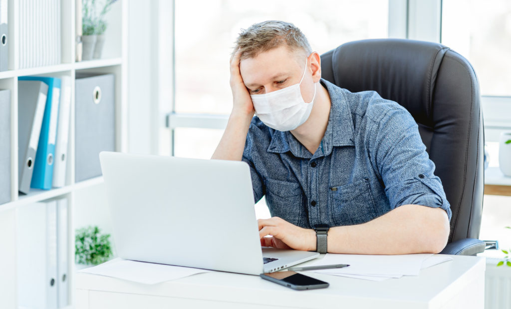 Distantly working man during coronavirus pandemic