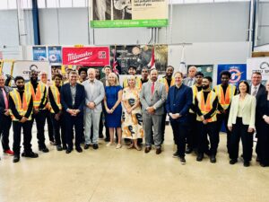 group photo of people smiling during a site visit to IBEW Local 353 in Mississauga