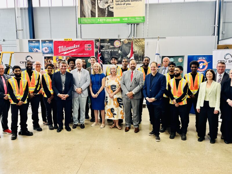 group photo of people smiling during a site visit to IBEW Local 353 in Mississauga
