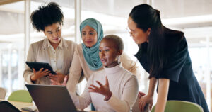 Women in office with laptop