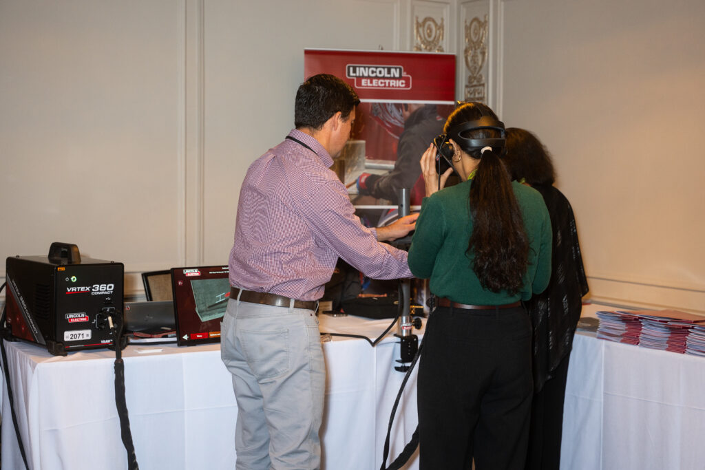 Attendees discuss technology for skills development