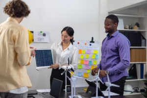 Renewable energy experts discussing solar panel project