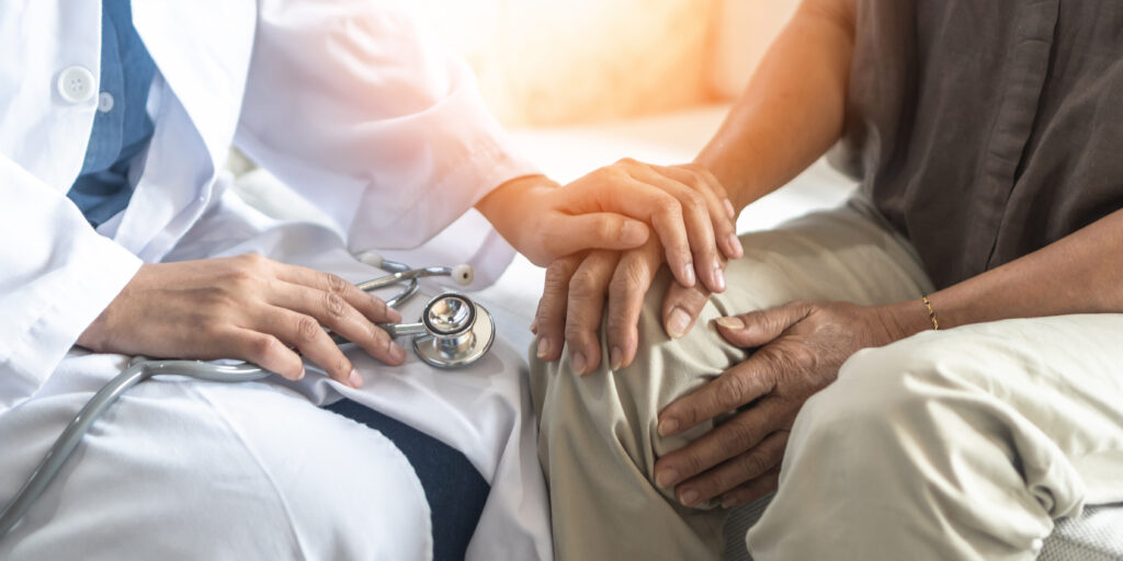Hand and knee pain or mental health care concept with geriatric doctor consulting examining elderly senior aged adult in medical exam clinic or hospital.
