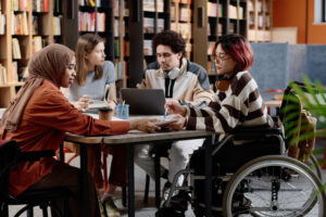 Diverse Students Studying In Library