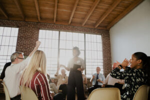 Enthusiastic group celebrates presentation