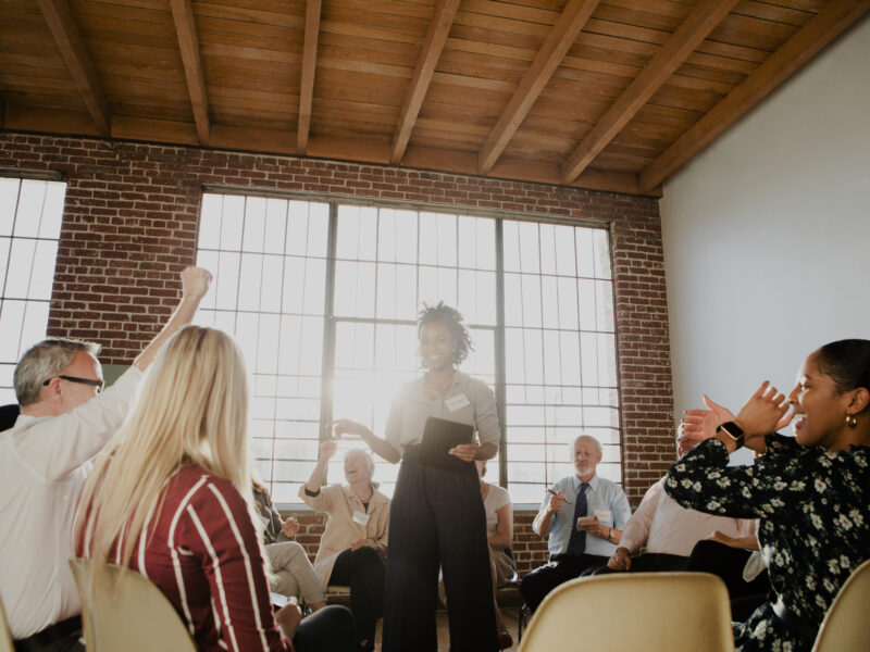 Enthusiastic group celebrates presentation