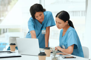 Nurses discussing at table