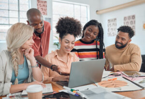 Group of diverse businesspeople having a meeting in a modern office at work.
