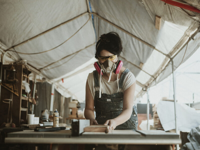 Female carpenter working in a workshop